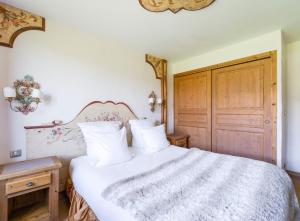 Postel nebo postele na pokoji v ubytování La Maison Hôtel Les Peupliers