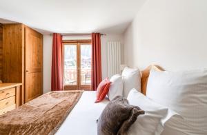 Postel nebo postele na pokoji v ubytování La Maison Hôtel Les Peupliers