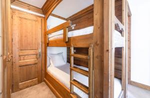 Postel nebo postele na pokoji v ubytování La Maison Hôtel Les Peupliers