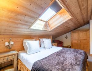 Postel nebo postele na pokoji v ubytování La Maison Hôtel Les Peupliers