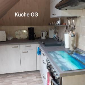 Η κουζίνα ή μικρή κουζίνα στο Ferienwohnung De Poppenstuv