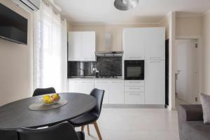 Η κουζίνα ή μικρή κουζίνα στο Leaf - ApartHotel 2