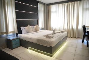 Postel nebo postele na pokoji v ubytování NT Hotels and Resorts Akridha