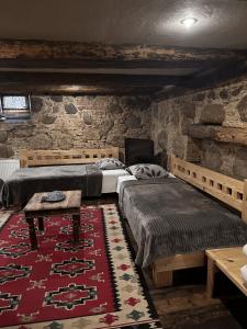 Postel nebo postele na pokoji v ubytování Fontaine Valhalla Hotel
