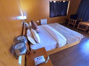 Rema Resort客房内的一张或多张床位