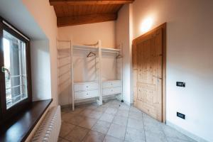 Postel nebo postele na pokoji v ubytování Forest Camp Val di Gresta