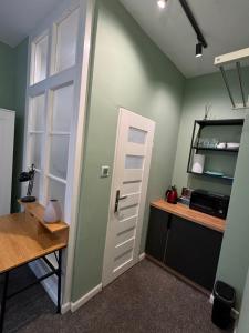 Kuchnia lub aneks kuchenny w obiekcie Jazzgot Apartamenty