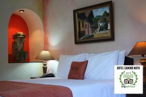 Cama o camas de una habitación en Hotel Camino Maya