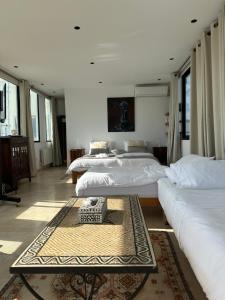 Cama ou camas em um quarto em Dar Souad