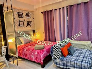 a bedroom with a bed and purple curtains at Lexon- Ethan in Baguio