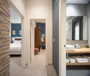 Ένα ή περισσότερα κρεβάτια σε δωμάτιο στο Terra Triana Apartments