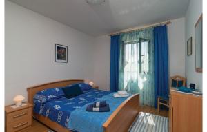 Postel nebo postele na pokoji v ubytování Apartment Supetar With Sea View Xii