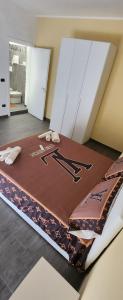 Postel nebo postele na pokoji v ubytování La Terrazza di Rovaglioso