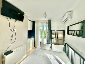 Postel nebo postele na pokoji v ubytování Apartmani Terminal