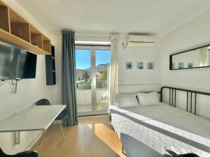 Postel nebo postele na pokoji v ubytování Apartmani Terminal