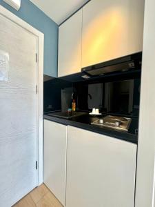 Kuchyň nebo kuchyňský kout v ubytování Apartmani Terminal