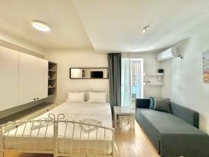 Postel nebo postele na pokoji v ubytování Apartmani Terminal