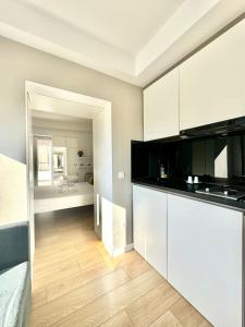 Kuchyň nebo kuchyňský kout v ubytování Apartmani Terminal