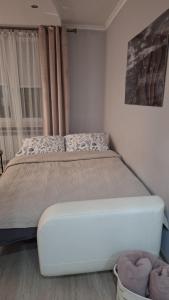Katil atau katil-katil dalam bilik di Apartament u Iwonki