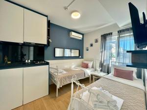 Kuchyň nebo kuchyňský kout v ubytování Apartmani Terminal