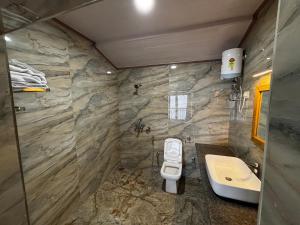 Koupelna v ubytování Asraya Homestay