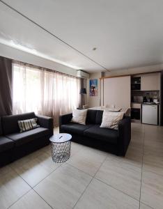 Kuchyň nebo kuchyňský kout v ubytování D Townhouse Boutique Suites