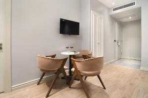 TV a/nebo společenská místnost v ubytování Ess Hotel
