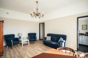 Posedenie v ubytovaní Blue Apartment Rajska