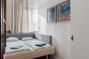 Posteľ alebo postele v izbe v ubytovaní Blue Apartment Rajska