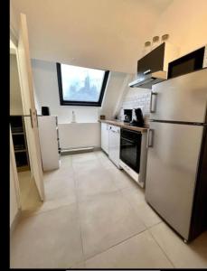 Kuchyň nebo kuchyňský kout v ubytování Appartement Saphir 2-6 pers - L' Artdu'Net -