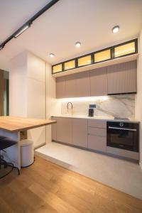 Kuchyň nebo kuchyňský kout v ubytování Apartment Legacy