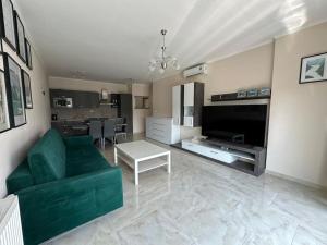Televízia a/alebo spoločenská miestnosť v ubytovaní Apartmán Zmeko Centrum Piešťany