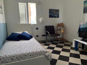 Ein Bett oder Betten in einem Zimmer der Unterkunft NATURAL CONFITAL BEACH