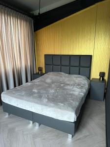 Ένα ή περισσότερα κρεβάτια σε δωμάτιο στο Privé sauna Bad Bentheim
