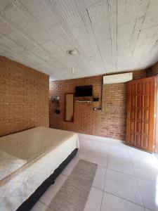 Et opholdsområde på Chalé confortável em Domingos Martins Village Rio da Montanha