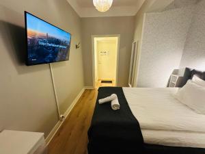 Postel nebo postele na pokoji v ubytování Vattengrändens Vandrarhem & Hotel