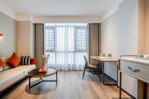 Φωτογραφία από το άλμπουμ του Echarm Hotel Du'an High-speed Railway Station σε Du’an