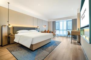 Φωτογραφία από το άλμπουμ του Echarm Hotel Du'an High-speed Railway Station σε Du’an