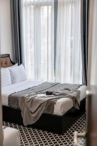 Postel nebo postele na pokoji v ubytování Tân Villa 2 Đà Lạt