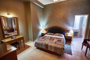 Postel nebo postele na pokoji v ubytování Exis Hotel