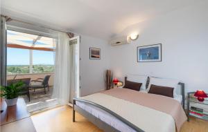Posteľ alebo postele v izbe v ubytovaní Cozy Home In Vela Luka With Sauna