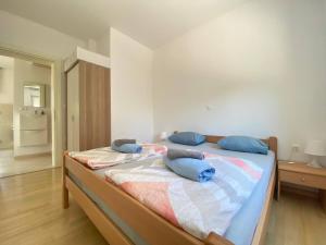 Posteľ alebo postele v izbe v ubytovaní Cozy Apartment Mediterraneo