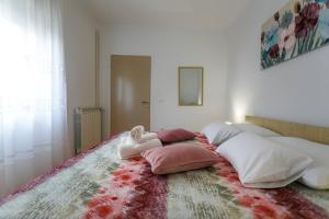 Postel nebo postele na pokoji v ubytování Apartments Paradiso