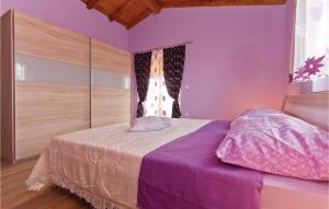 Postel nebo postele na pokoji v ubytování Holiday Home Peresiji I