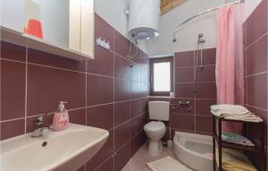 Koupelna v ubytování Holiday Home Peresiji I