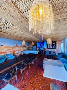 TV a/nebo společenská místnost v ubytování Terrasseplage Appartement 2 chambre N3