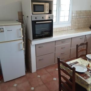 Η κουζίνα ή μικρή κουζίνα στο VILLA Charly, Spacieux appartement proche Deshaies