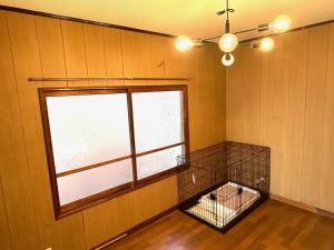 A bed or beds in a room at ポートサイドSasebo藤原町
