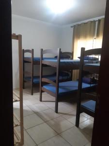 Postel nebo postele na pokoji v ubytování Cascais Quartos & Suítes