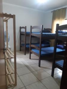 Postel nebo postele na pokoji v ubytování Cascais Quartos & Suítes